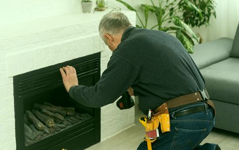 Insert fitted level beneath a mantel